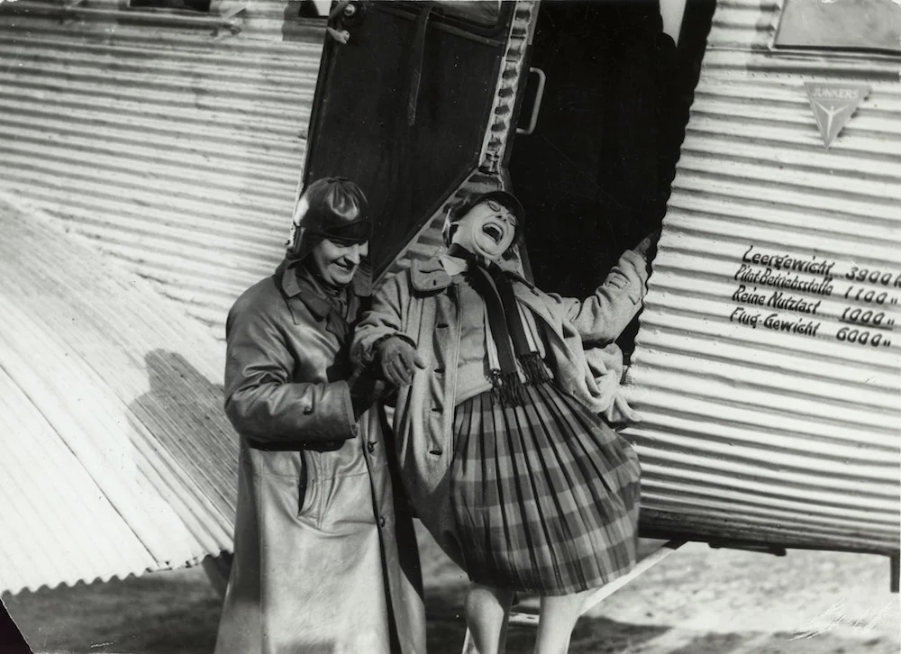 Photographer unknown, Rodchenko and Stepanova descending from the airplane. (for the film The General Line by Sergei Eisenstein), 1926. Courtesy Rodchenko and Stepanova Archives, Moscow