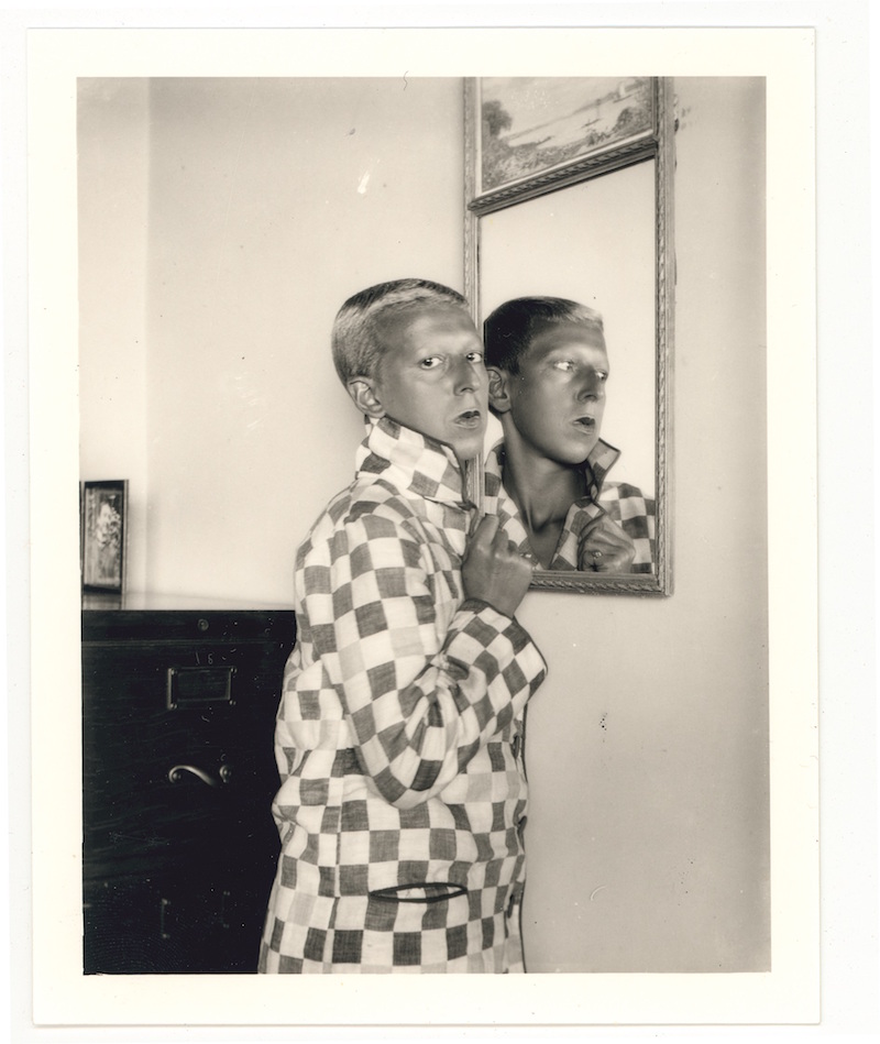 Claude Cahun,  Self-portrait (reflected image in mirror, checked jacket) , 1928. Courtesy of Jersey Heritage Collections