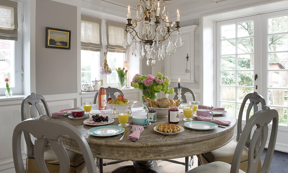 Enjoy a relaxed and sophisticated breakfast under a painted ceiling