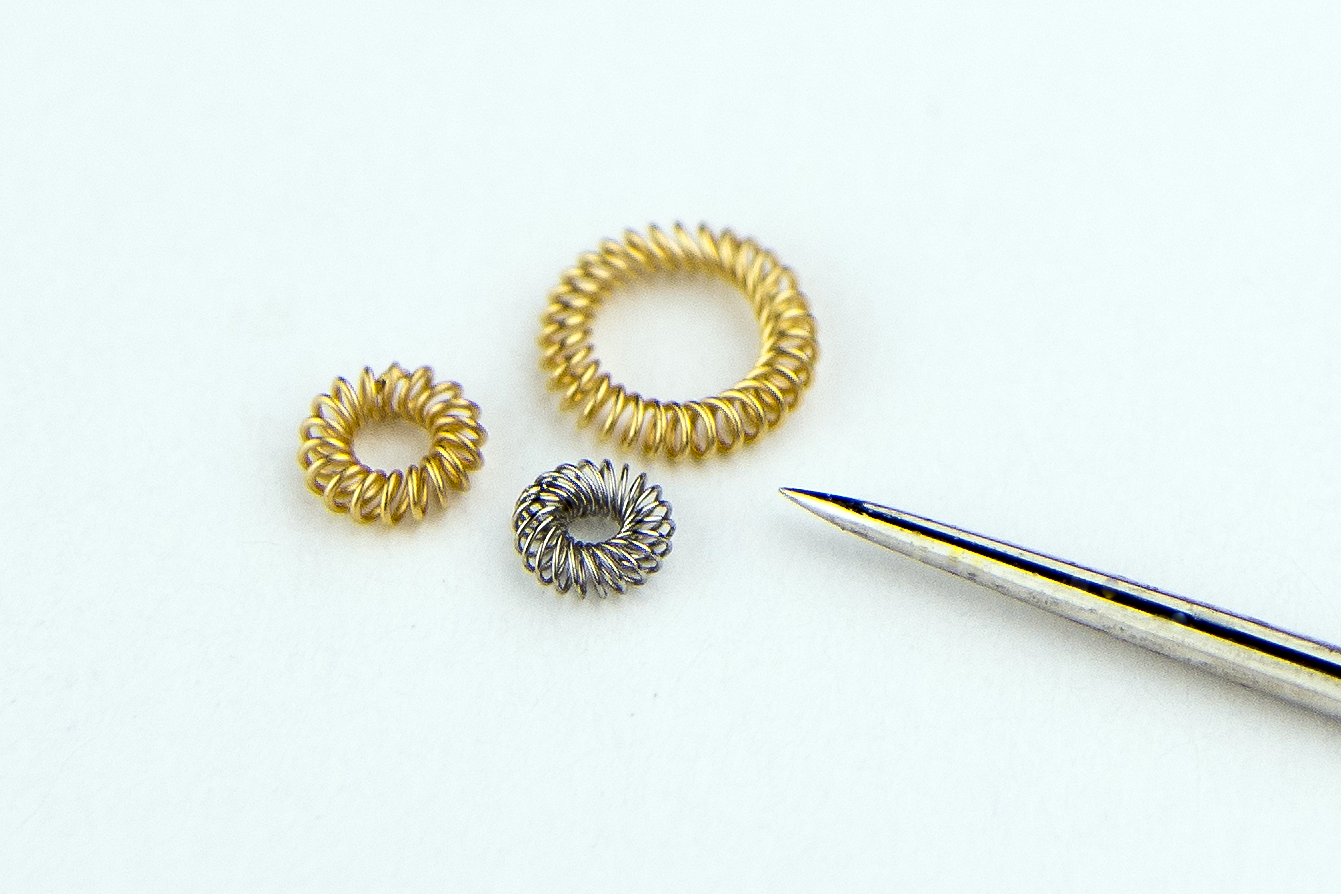  MICRO PLATED SPRING BESIDE SEWING NEEDLE
