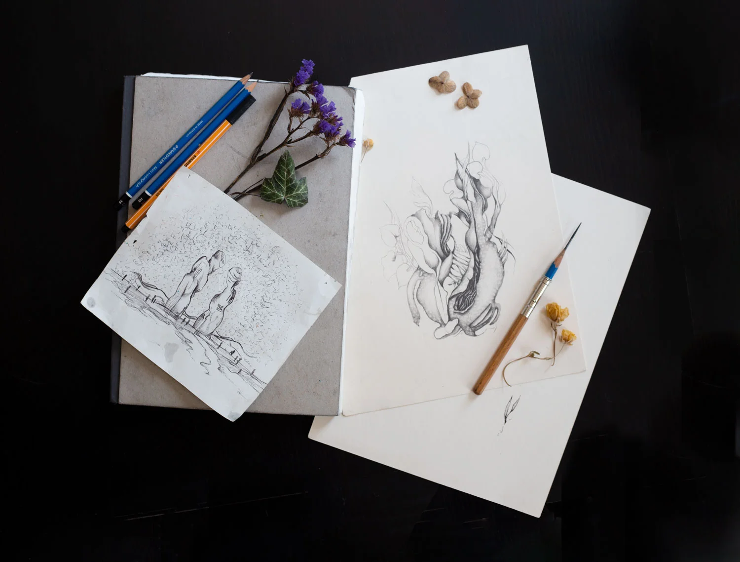 In the photo above, the small square sketch on the left side was the brain child for my painting called Paragon, available in the Print Shop. On the right is the beginning of my piece Regeneration.