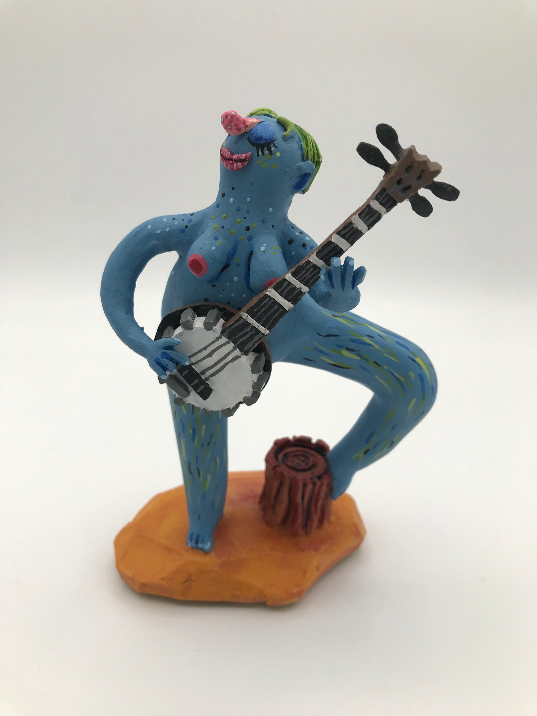 Fertility Goddess plays her banjo