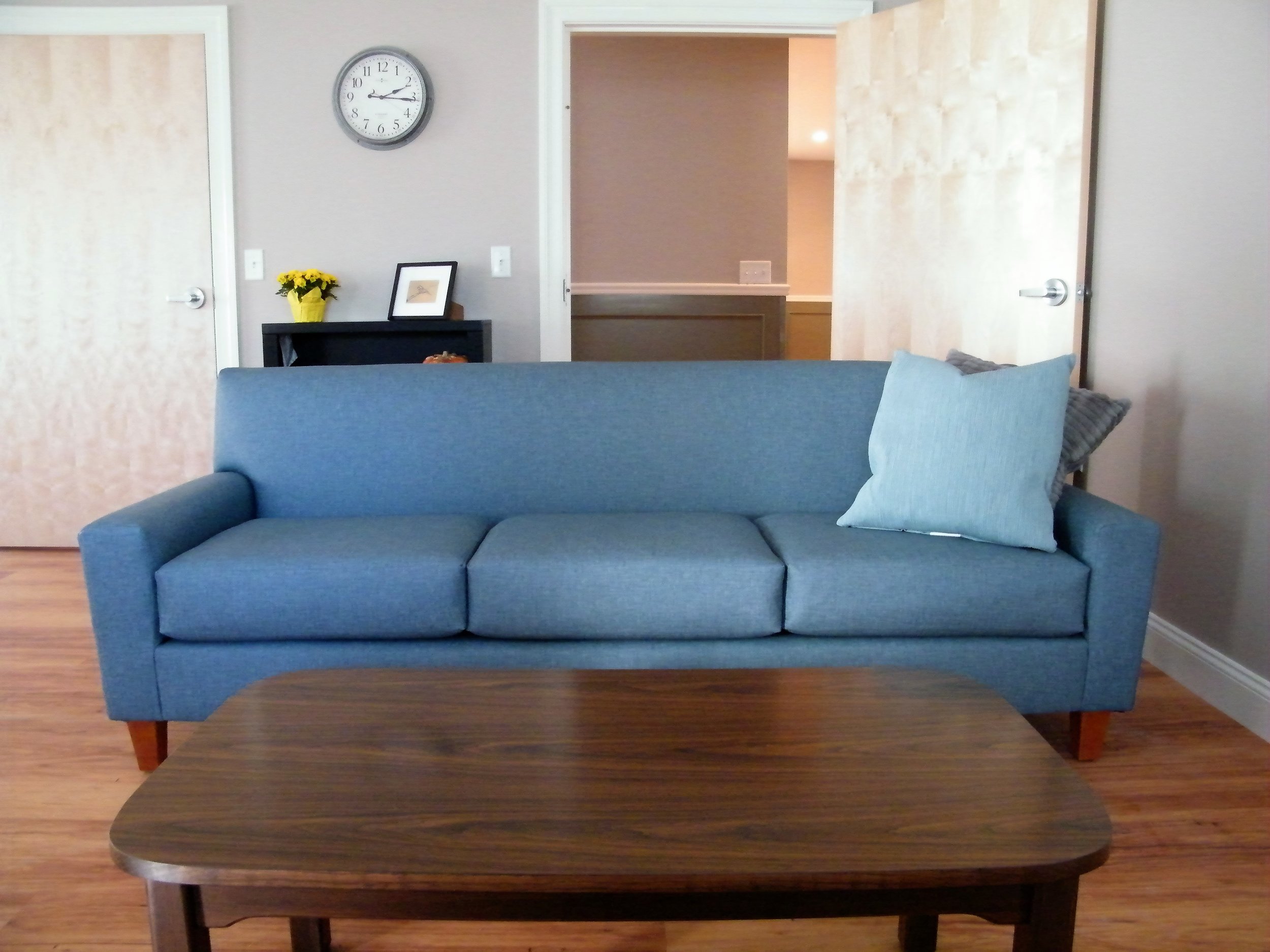 Syracuse Sofa with Vinyl Decking in Contempo Griege Vinyl, Parsons Leg Coffee Table with Rounded Edges in Walnut Finish