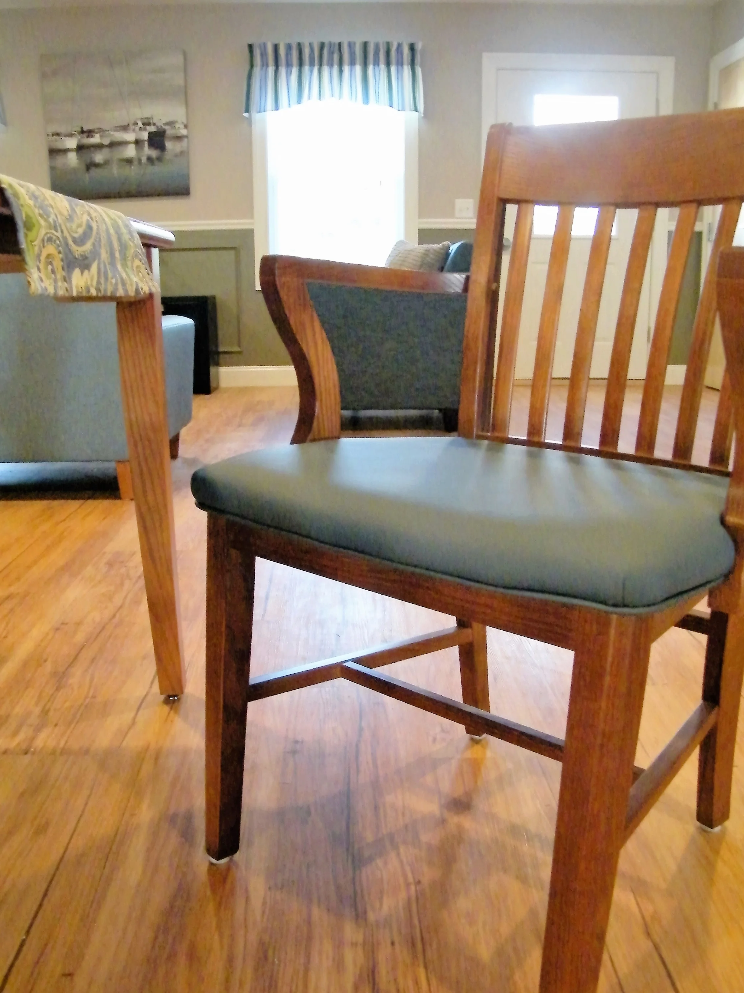Schoolhouse Arm Chair with Vinyl Covered Padded Seat