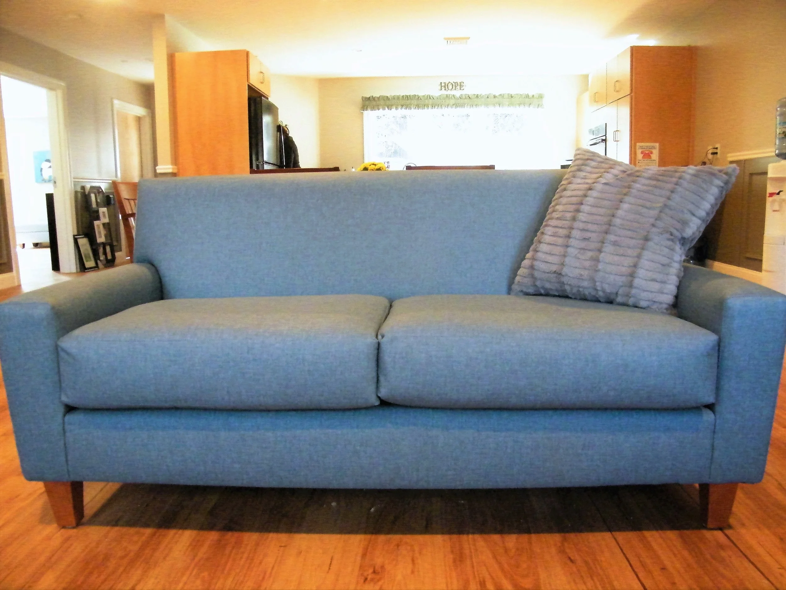 Syracuse Loveseat with Walnut Legs and Vinyl Decking in Contempo Griege