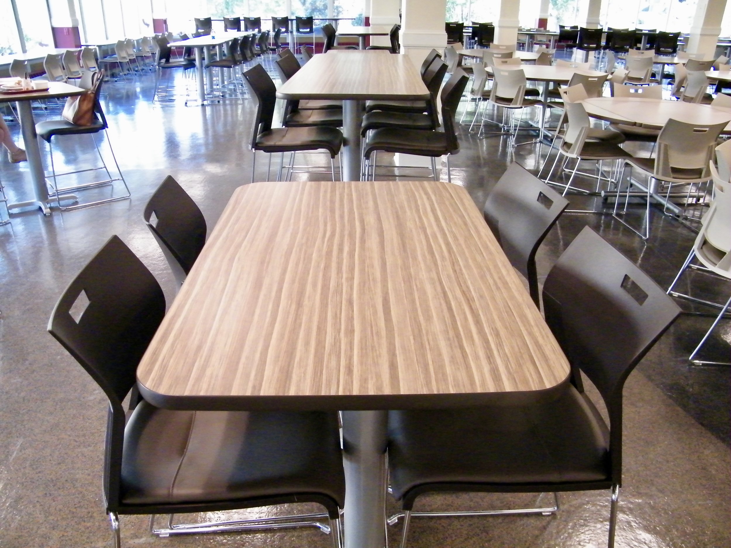 counter height duet chairs with laminate top pvce edge tables in university dining setting