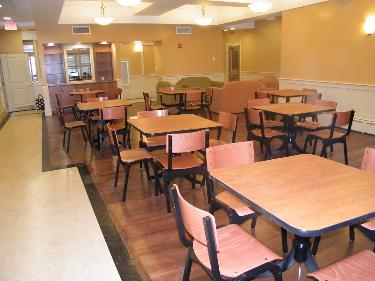 Carlo Stack Chair; laminate top tables, pvc edge, hudson forge decorative base