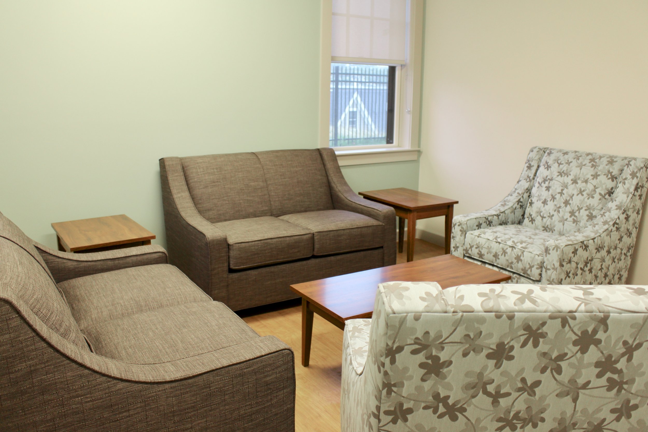 family room with carnegie upholstery and shaker tables