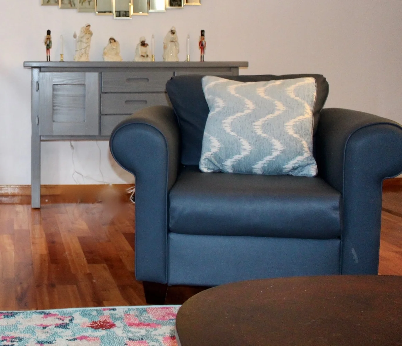Hannah Rocker and classic sideboard in lving room on location
