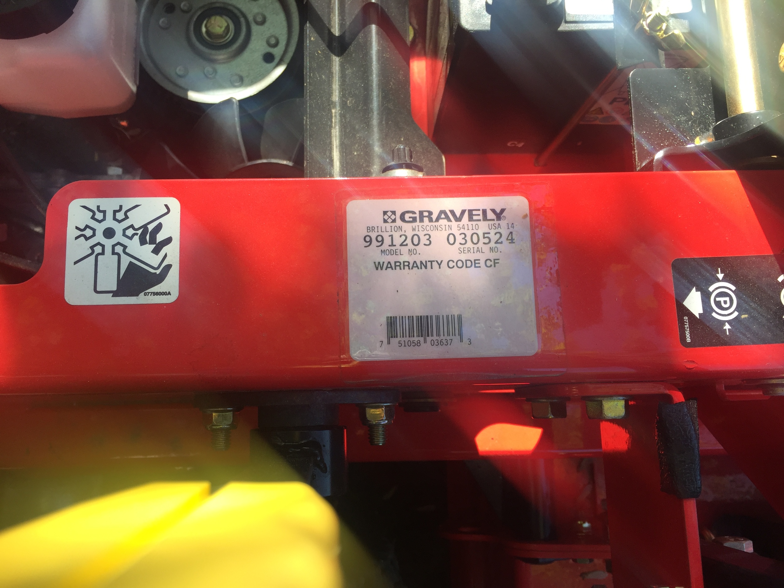Under seat on tractor frame.