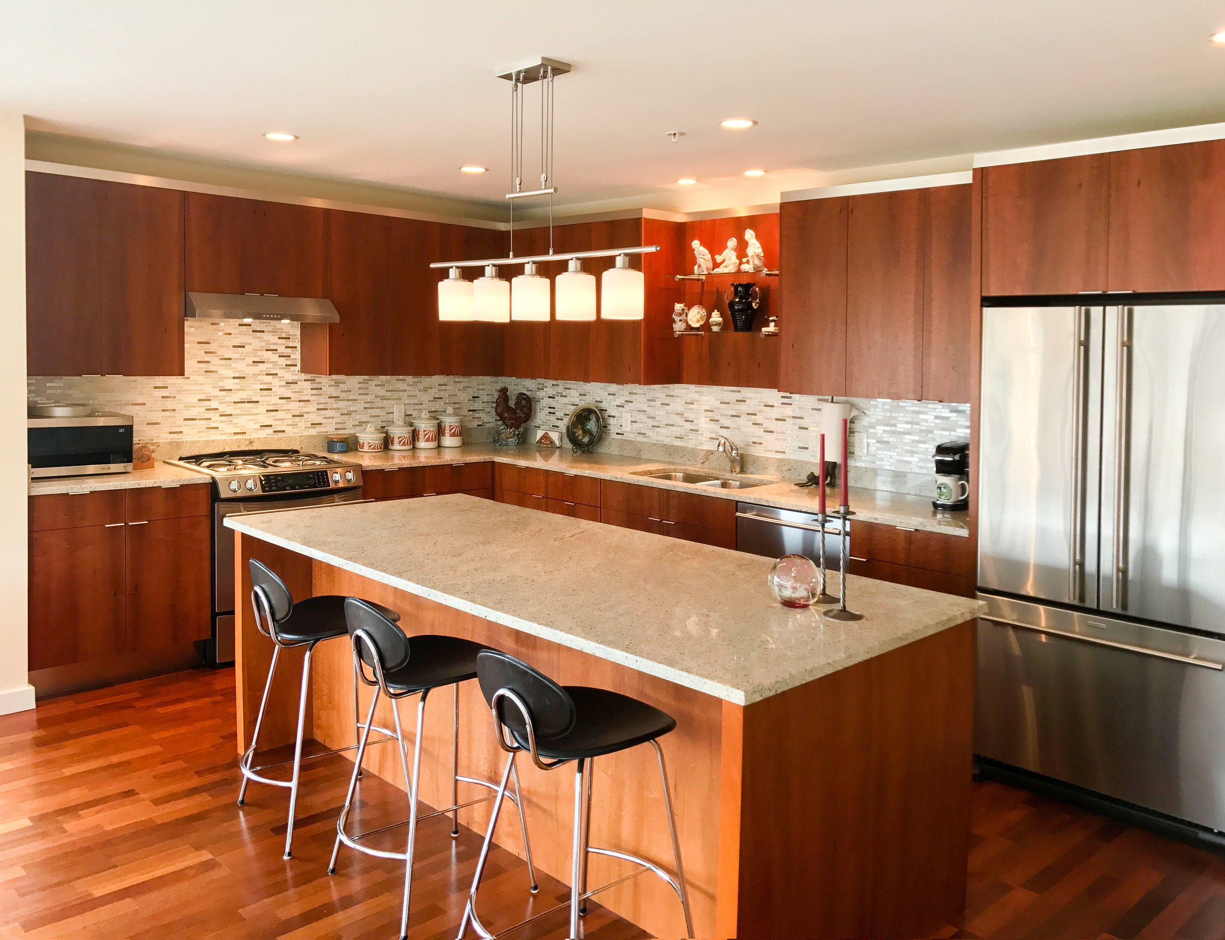 Complete Kitchen Remodel with new wood cabinets to match existing hardwood floor