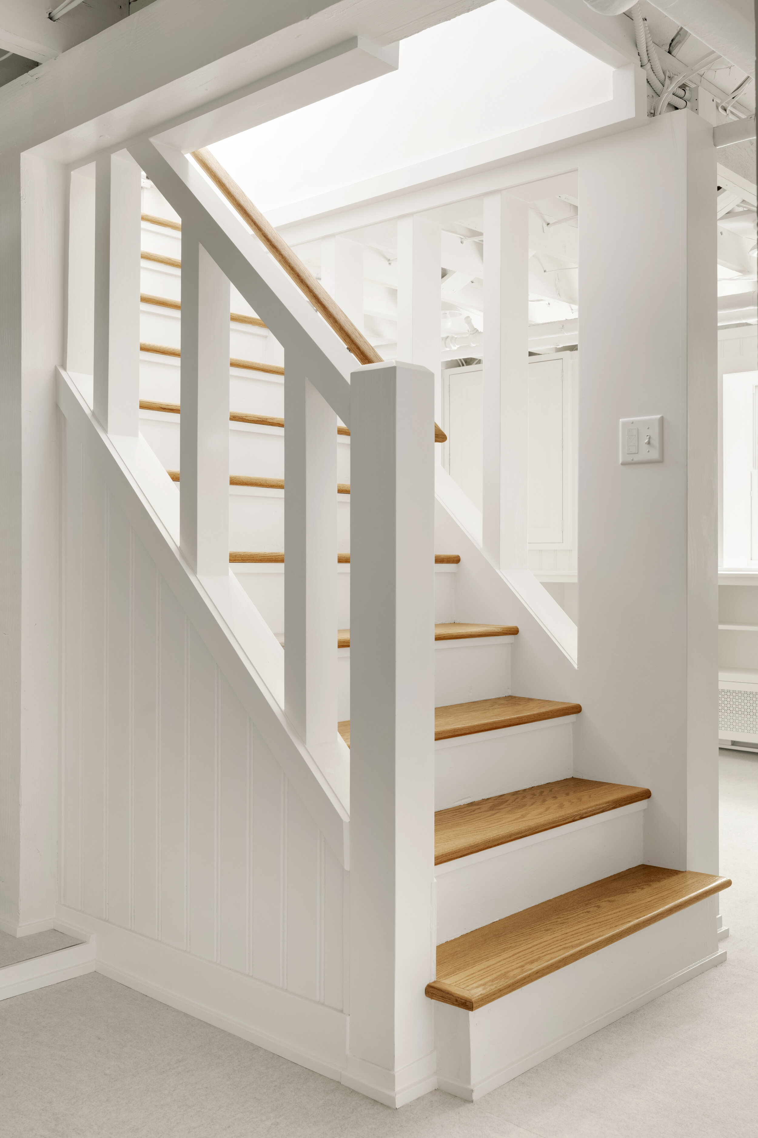 Stairs in an unfinished basement