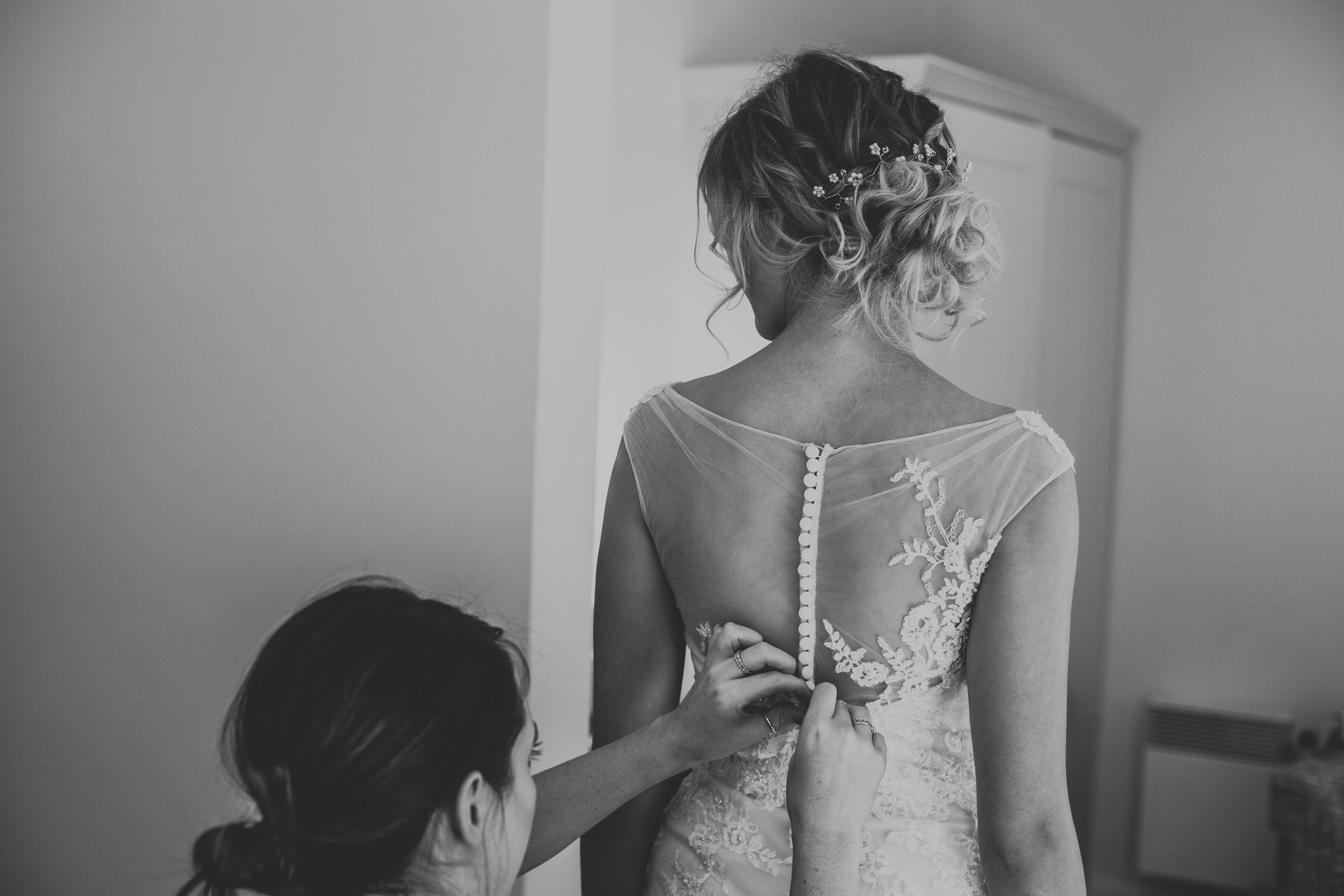 TerraVina-Styled-Wedding-black and white back shot of hair doing dress up .jpg