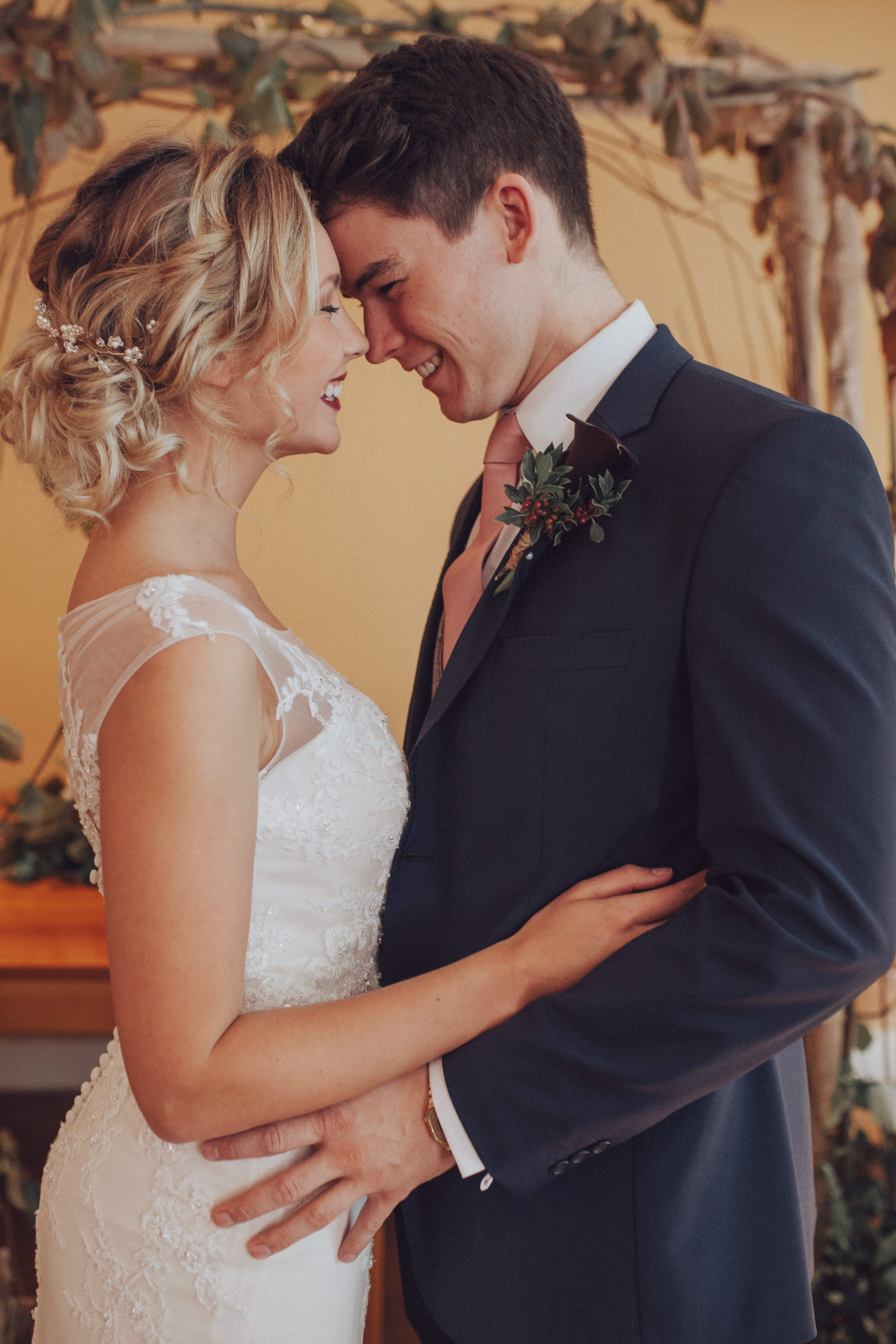 TerraVina-Styled-Wedding- side shot of hair, kissing groom.jpg