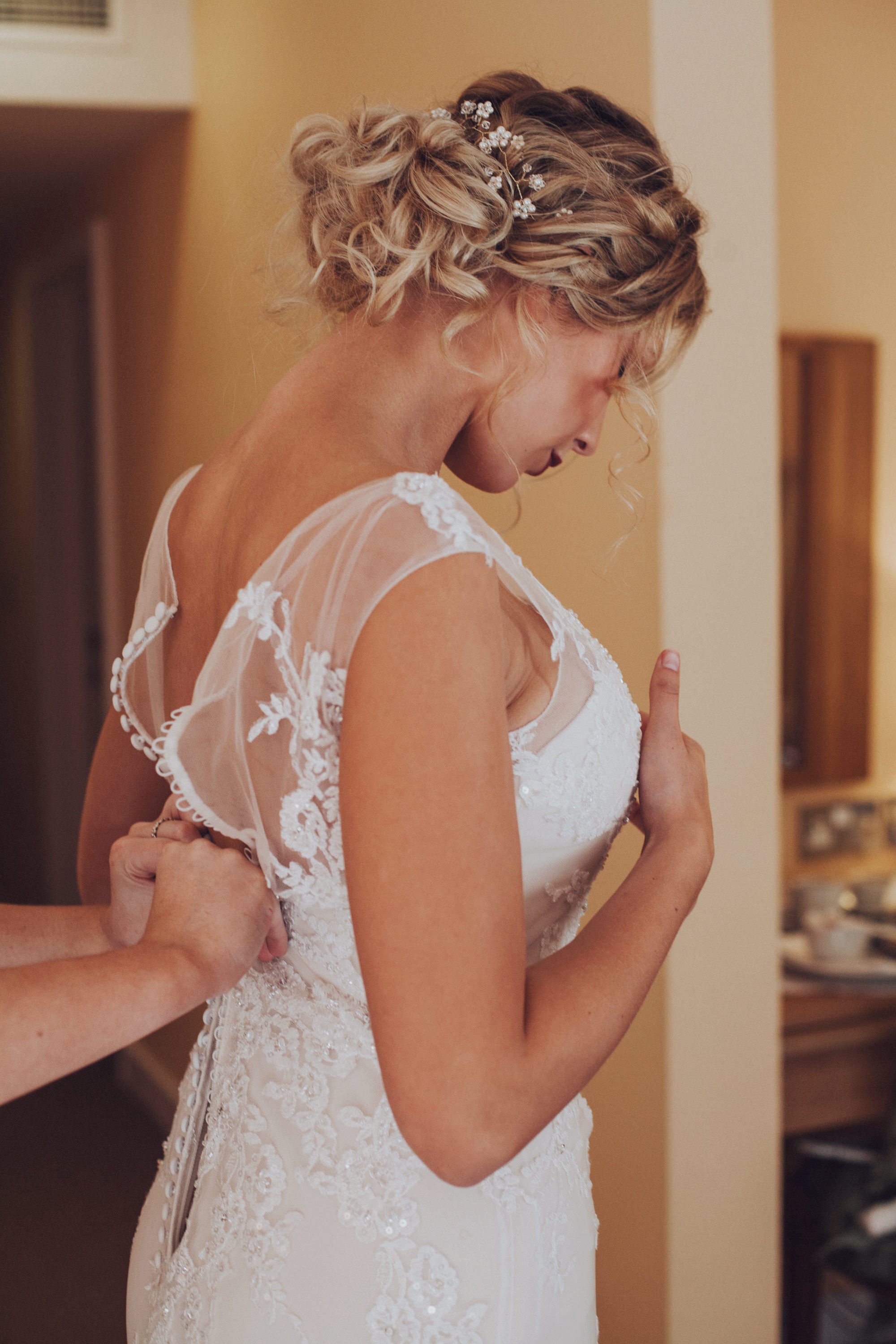 TerraVina-Styled-Wedding-back shot of hair doing dress up.jpg