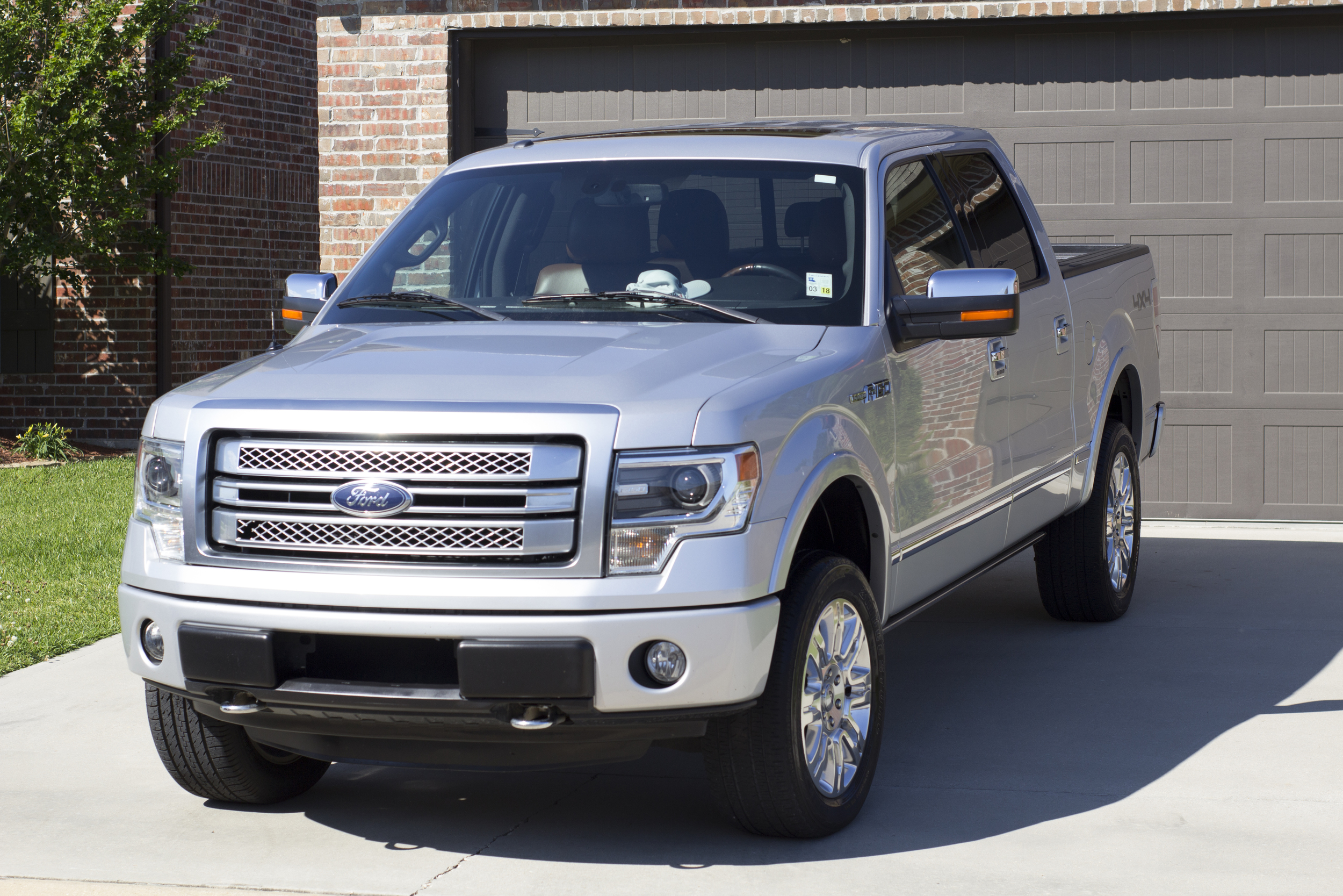 "My F-150 crew cab had several scratches and flaws in the paint. The gold package with the clay bar treatment, compound, and sealer brought all of the flaws out and had my truck shining like new. Very happy customer!" - David