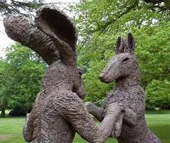 Sophie Ryder's Pink Lady Hair Dancing with Big Brown Dog