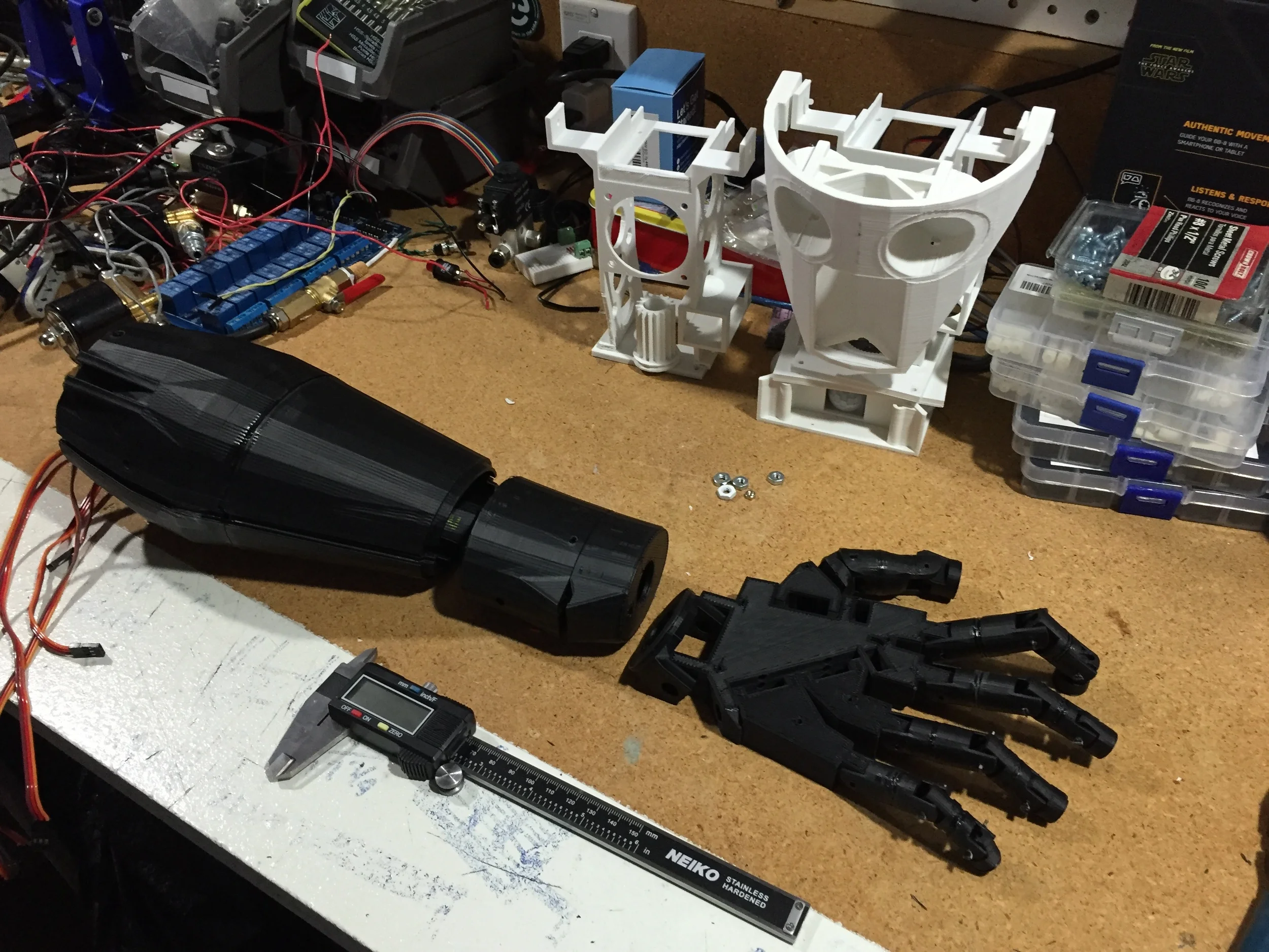 The almost complete Inmoov hand and forearm. The Inmoov's design uses 5 servos to control each finger and 2 more servos to rotate the wrist and hand. All those servos mean a lot of weight. Perhaps future versions I will convert these back to air muscles to save weight.
