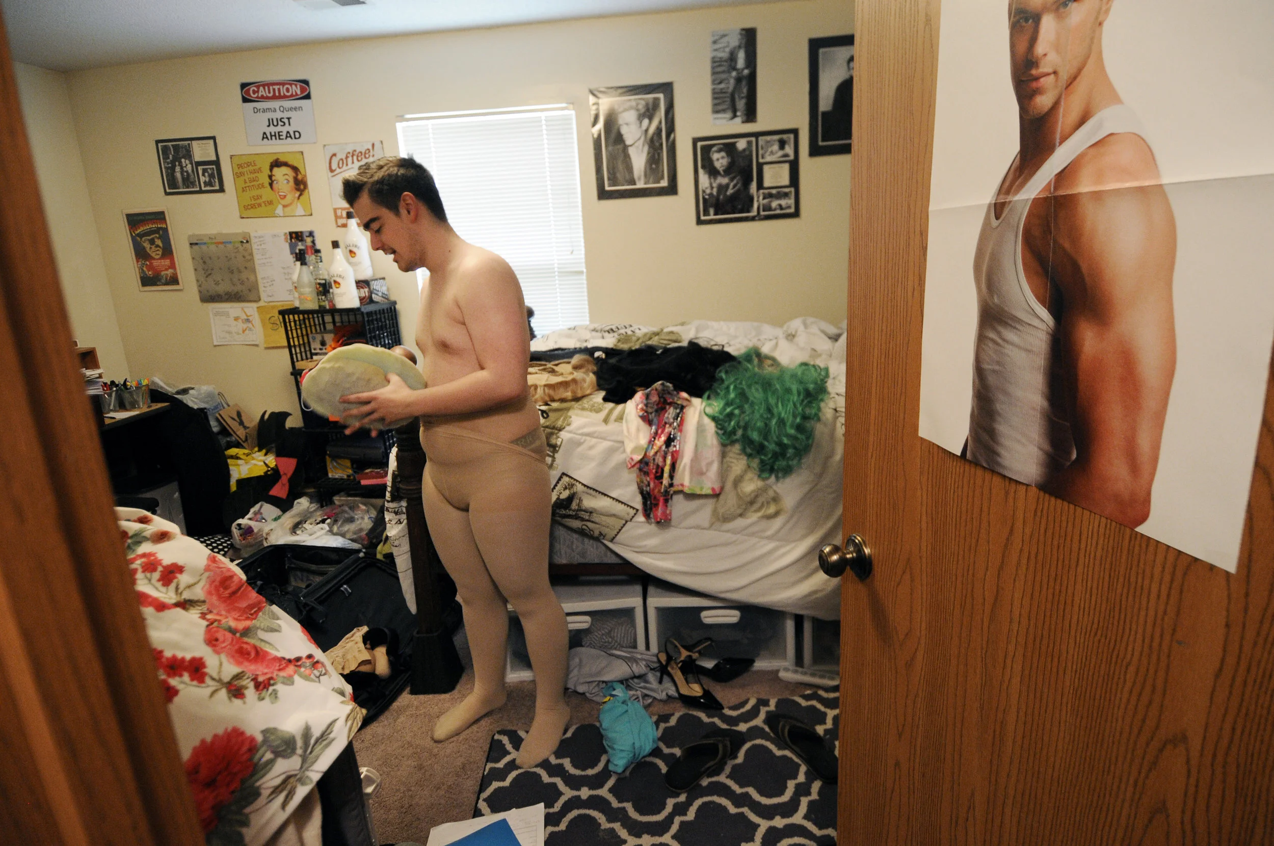 Shawn James prepares to pack his foam padding used for his hips before a Thursday night drag show on April 21, 2016 at Yin Yang Night Club in Columbia Mo. James is originally from Blue Springs, Mo., and began making a name for himself in the drag co