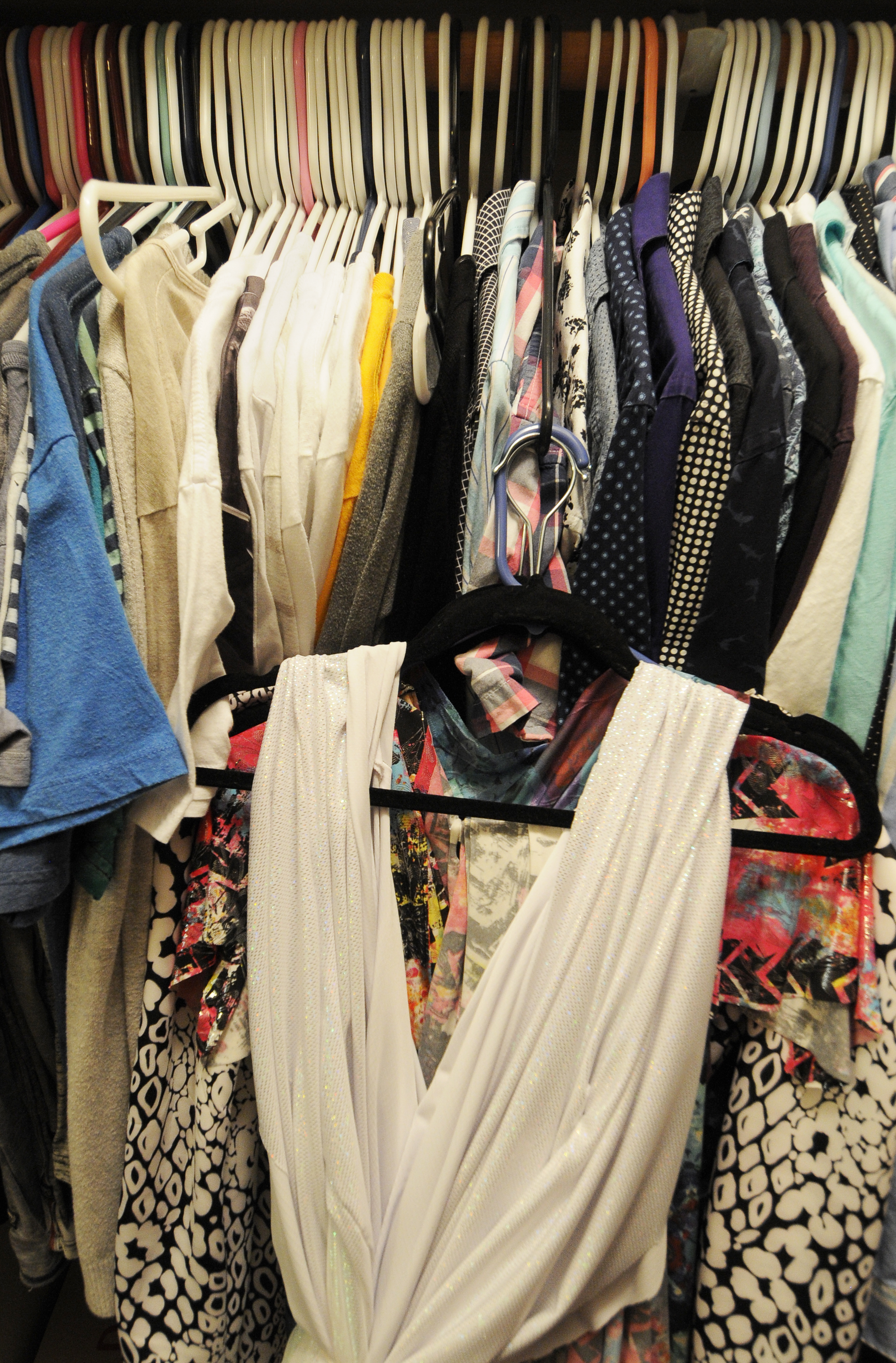  James' closet overflows with both feminine and masculine apparel. He tries to keep his everyday apparel separate but has found that Veronika Versace's outfits, wigs, and accessories have taken over. Being a Textile and Apparel Management major at th