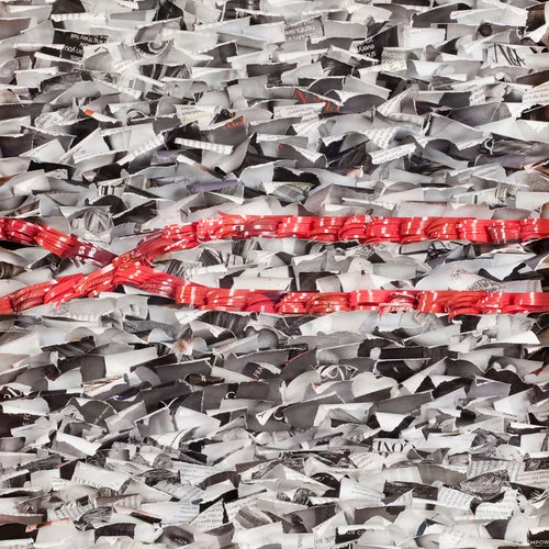 Crossing Paths Gray, one of two original paper artworks by Marilyn McRae on exhibit at Gallery 825.