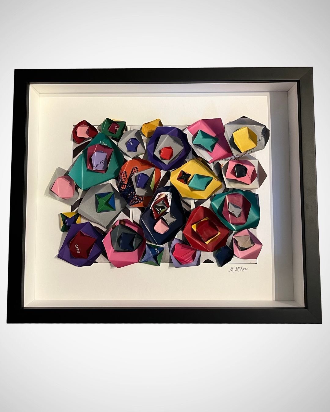 Color Blocking 1, a playful study in color, shape, and dimension. Layered and folded paper forms come together to create a vibrant composition where every piece adds its own personality. Available in studio, framed 18&rdquo;w x 15&rdquo;h x 1.37&rdqu