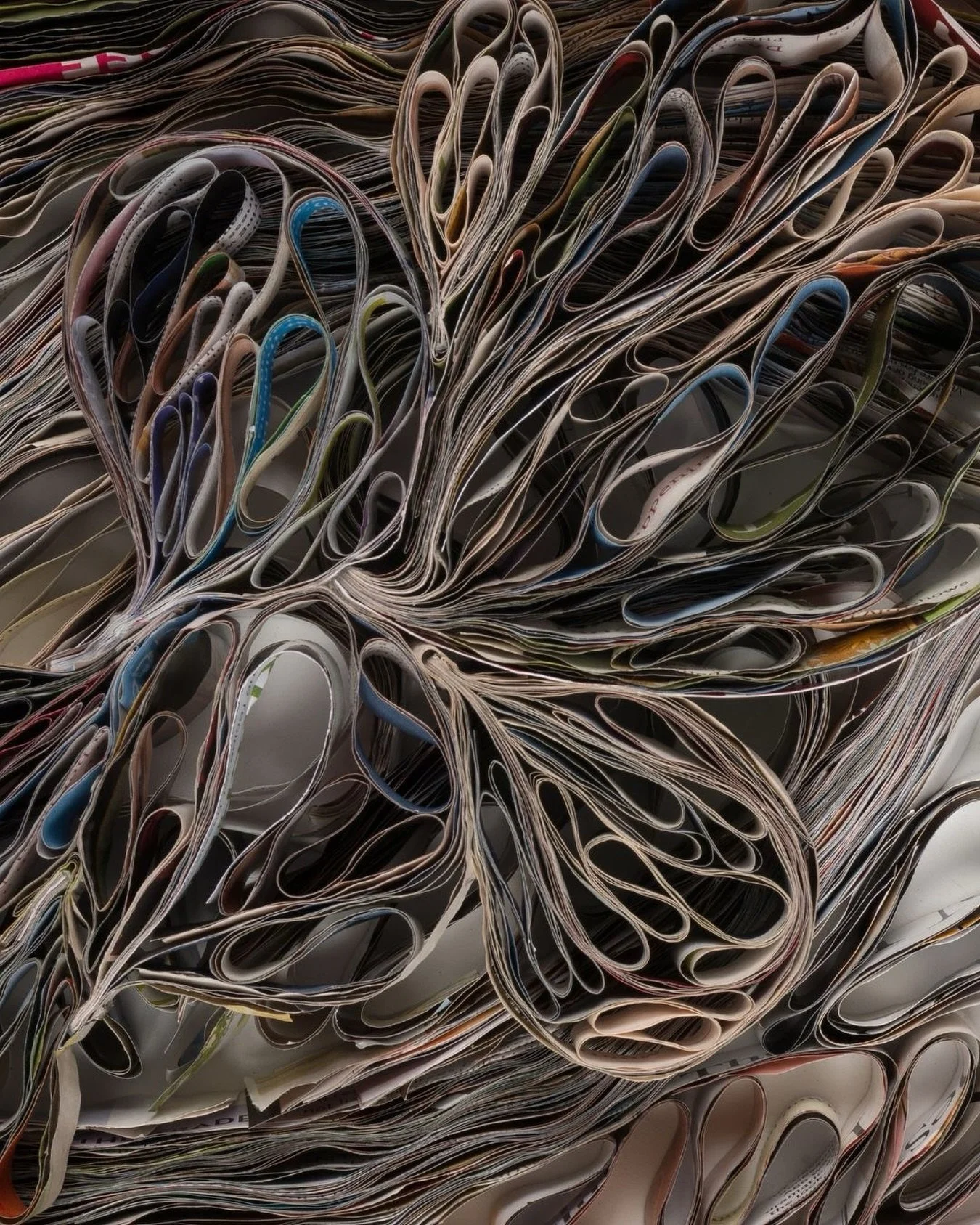 Creativity does not always require rare or precious materials. Sometimes the most interesting possibilities are hiding in the things we already have around us - recycled magazine pages #paperart