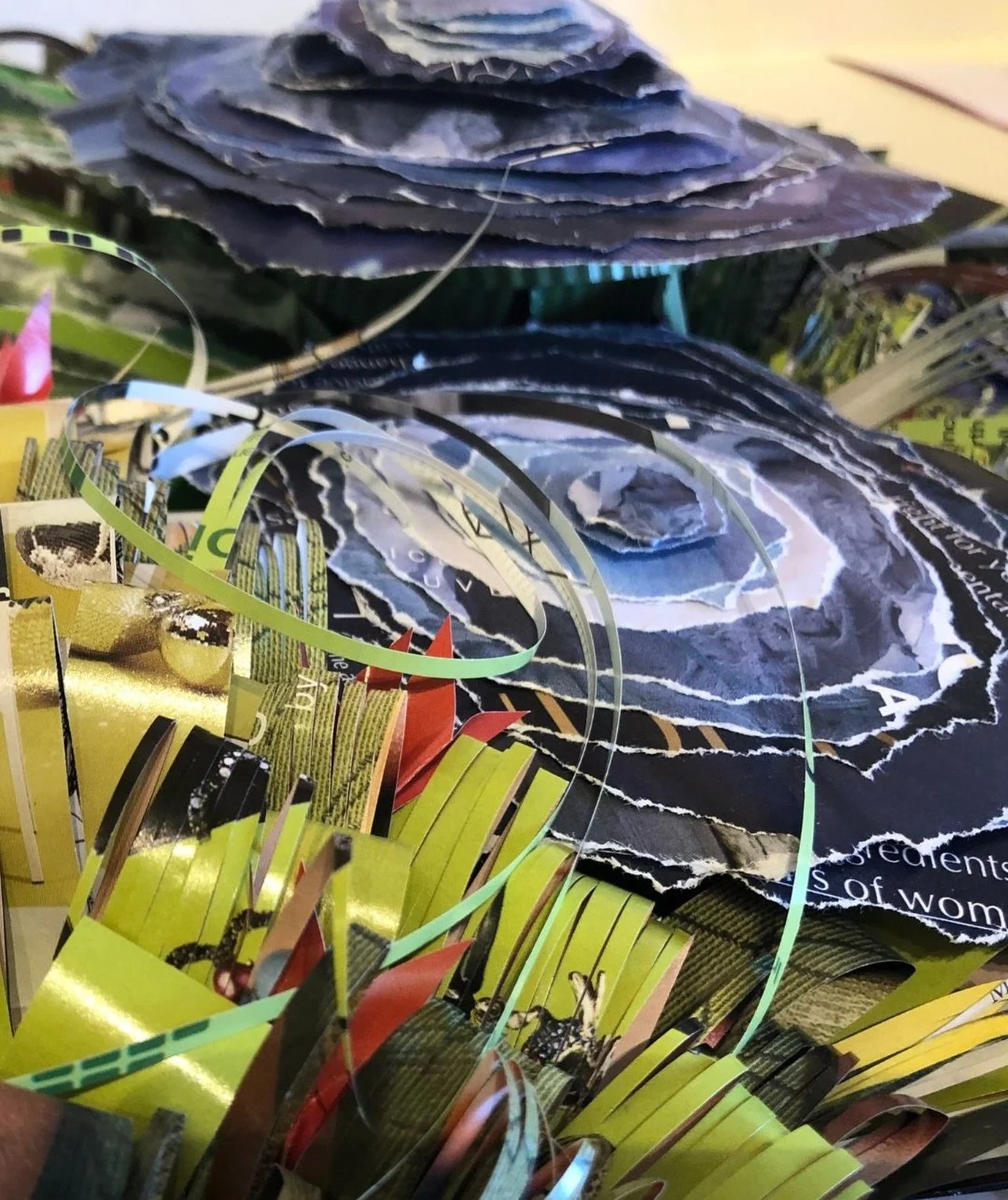 Window View, detail, original paper art. Some views are never quite the same twice.

Window View explores the idea of an ever-changing landscape&mdash;where color, texture, movement, and light shift from moment to moment. Created from recycled magazi