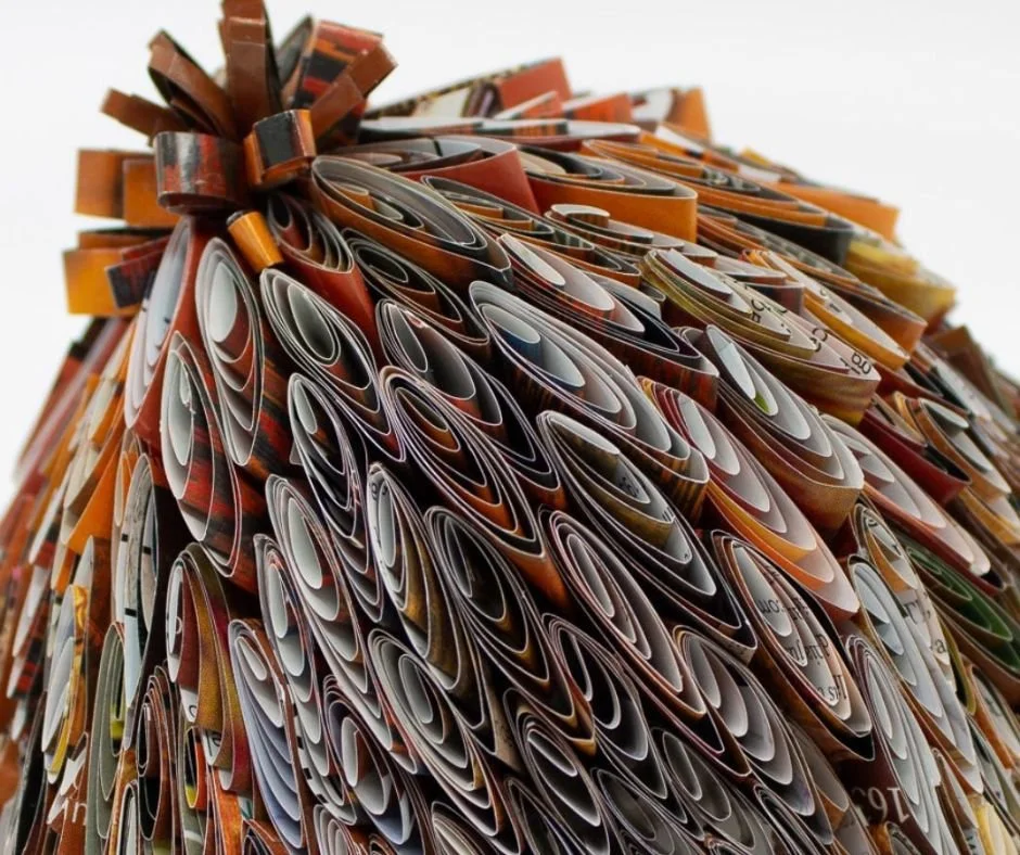 top knot by marilyn mcrae, original paper art showing the repeated folds and stacking to create a sculpted form