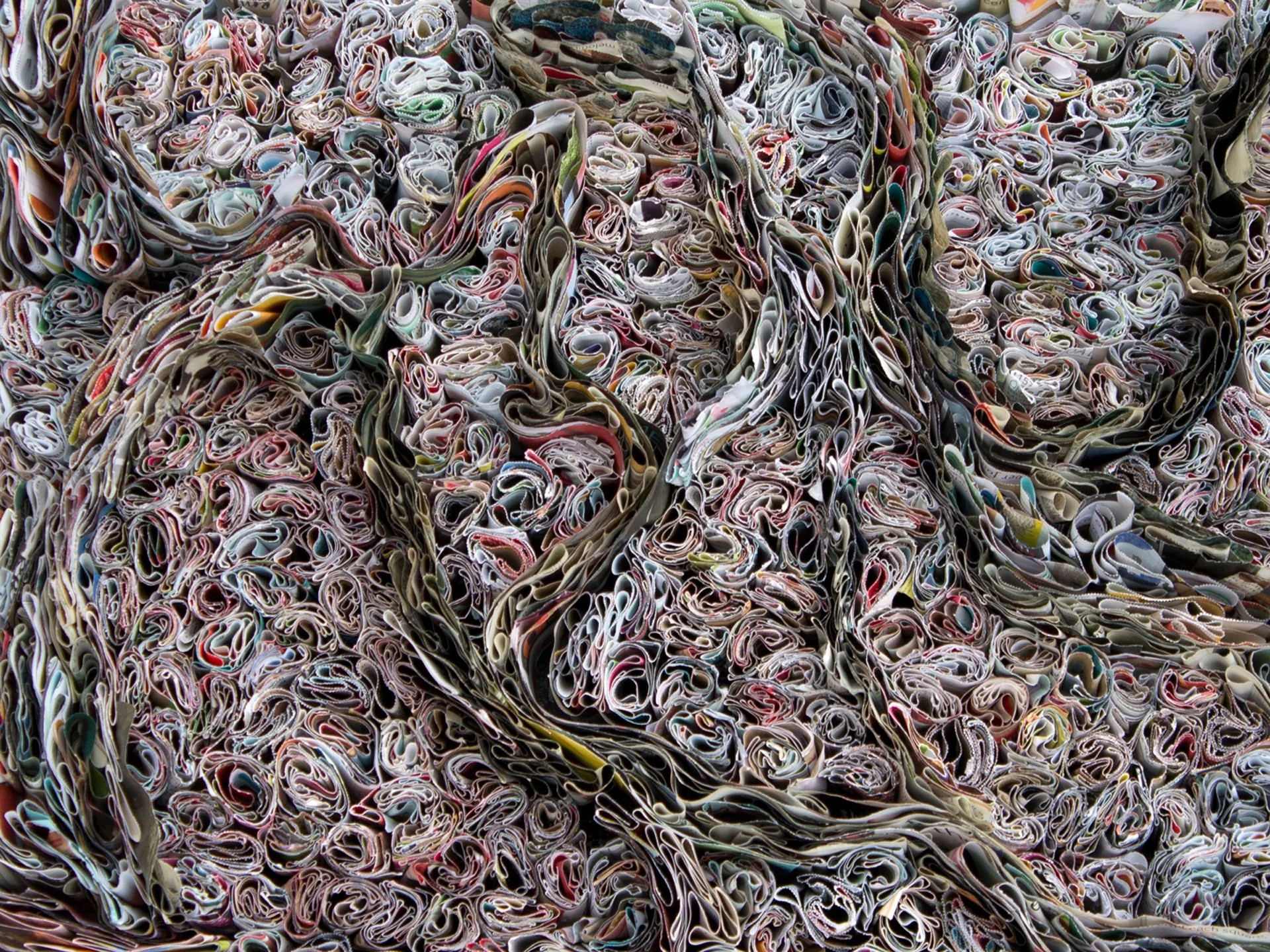 original paper artwork titled Organic Study 2 by Marilyn McRae that shows recycled magazine paper soaked and shaped