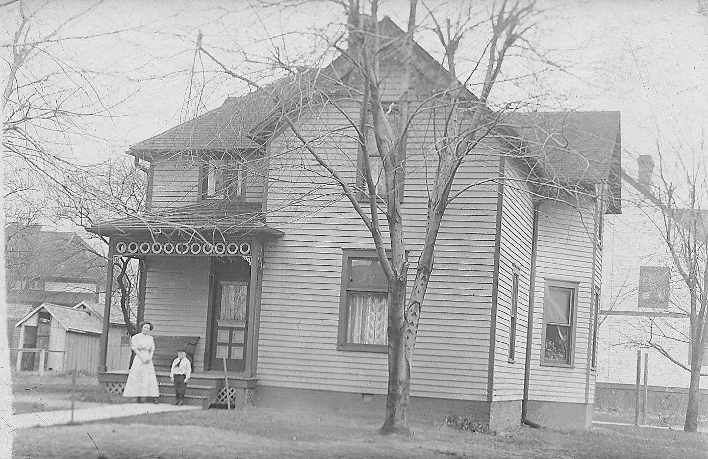   This photo shows siblings Laura and Kenneth Shaw in front of the house at 409 Jefferson circa 1904 (Courtesy of Elizabeth Shaw Stolte)  