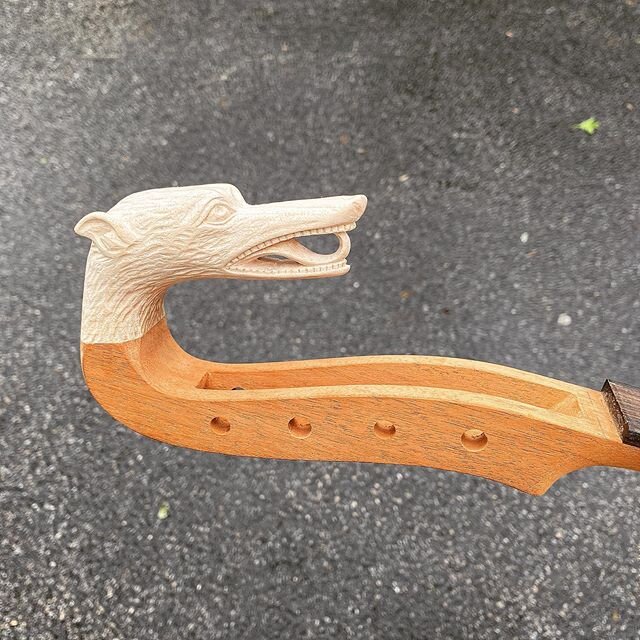 Carved maple wolf head for a local luthier on the headstock of a colascione he is building. It&rsquo;s a long necked lute from the Baroque era. 3rd photo shows the inspiration.  #luthier #stringedinstrument #woodcarving #handcarved #woodworking #cust