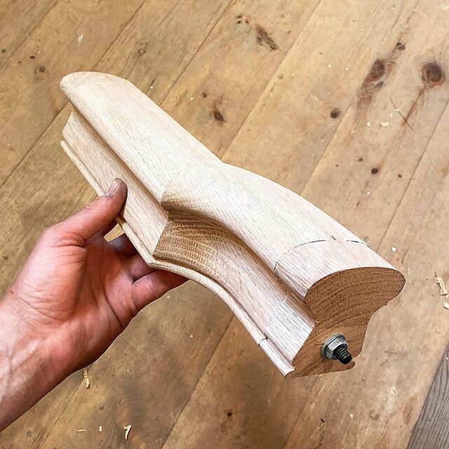 A carved miter for a little jog in the railing where it anchors to the wall corner at the top floor. I love this solution and will always opt to carve a miter in situations like this whenever practical.