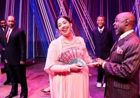 Hermione (Regina Morones) and Polixenes (ShawnJ West) enjoy each others company with her son, Mamillius (Cameron Payne) looking on. King Leontes, (Eric Reid) looks on suspiciously. Photo credit: Jay Yamada