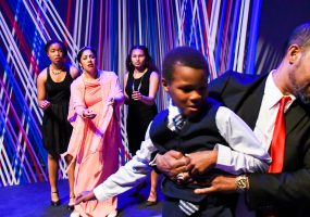 King Leontes (Eric Reid) takes custody of his son, Mamillius, (Cameron Payne) to punish his wife, Hermione (Regina Morones) for her supposed infidelity. Photo credit: Jay Yamada