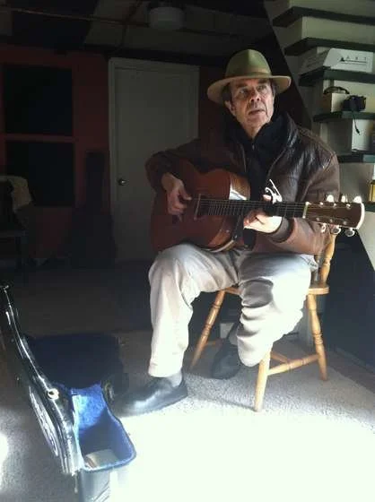 Doc Zig with his guitar