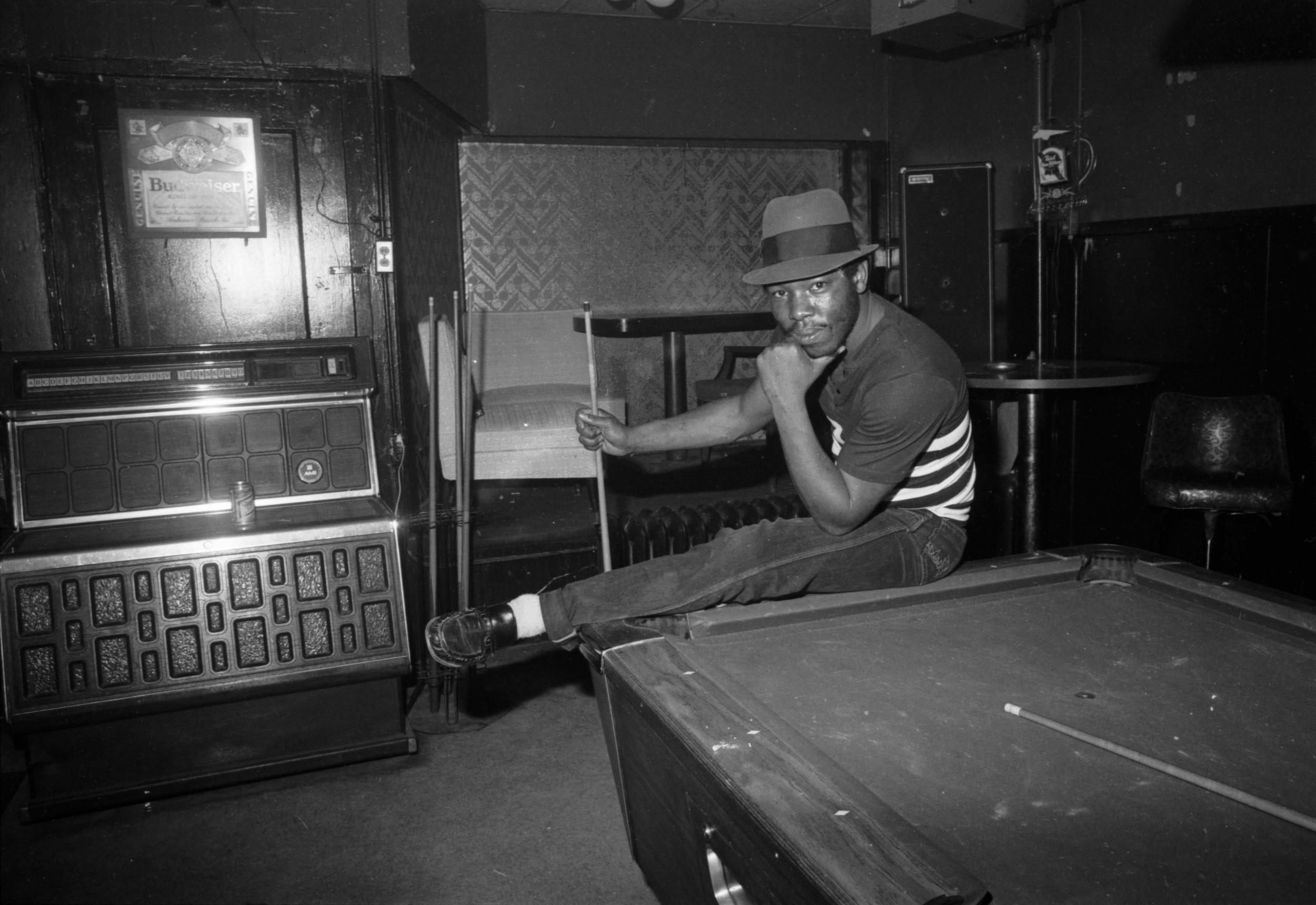 Man on pool table.jpg