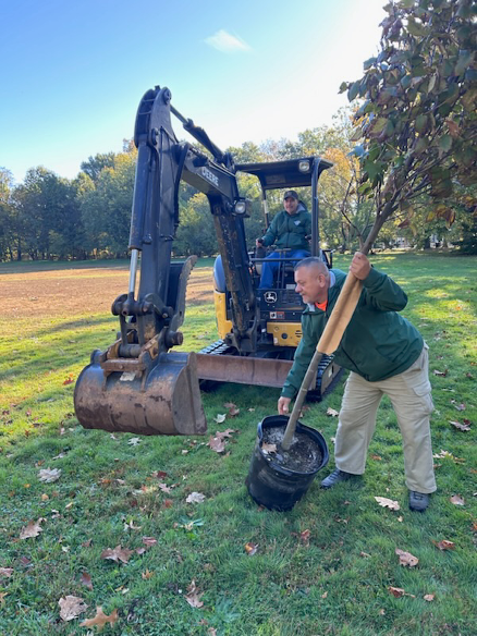 Essex County Parks Department crew prepares to dig a hole