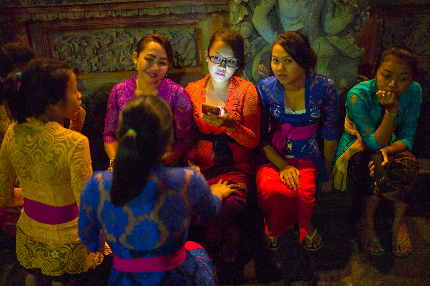 Girls from the village are decked out in their traditional outfits