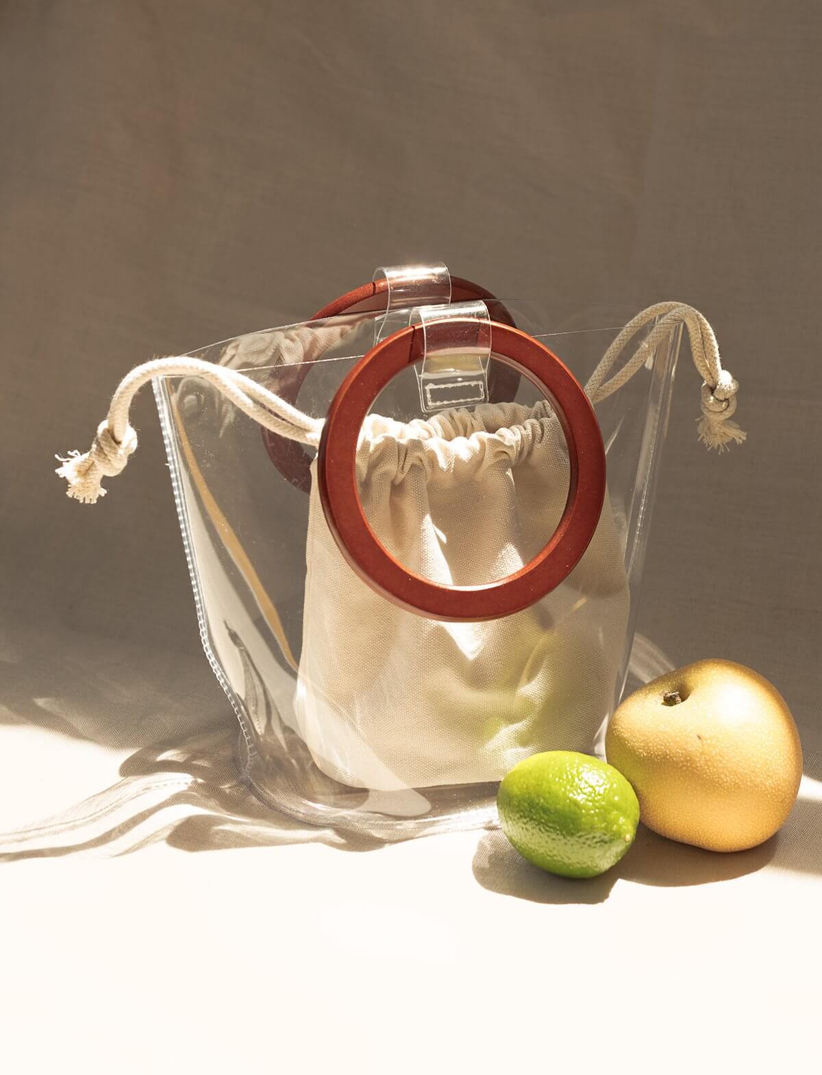 Ring Handle Clear Vinyl Bag by Pixie Market $59