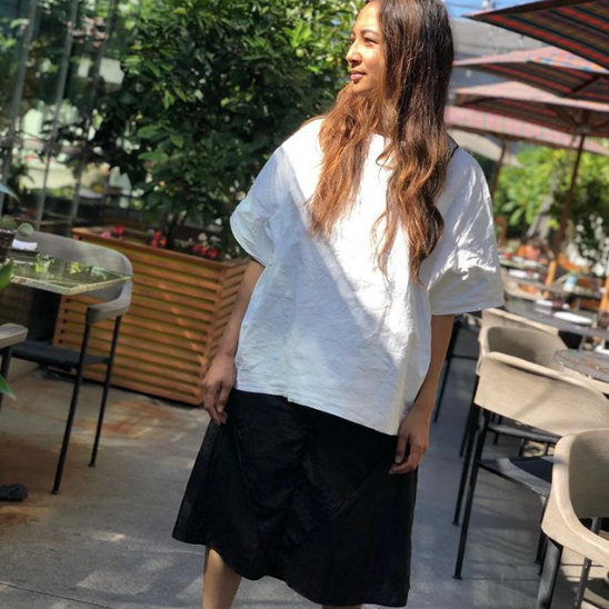 WOMAN: ADELE TETANGCO  