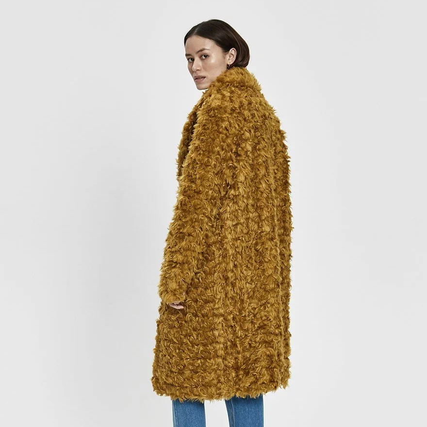 I Live In This Coat Now 