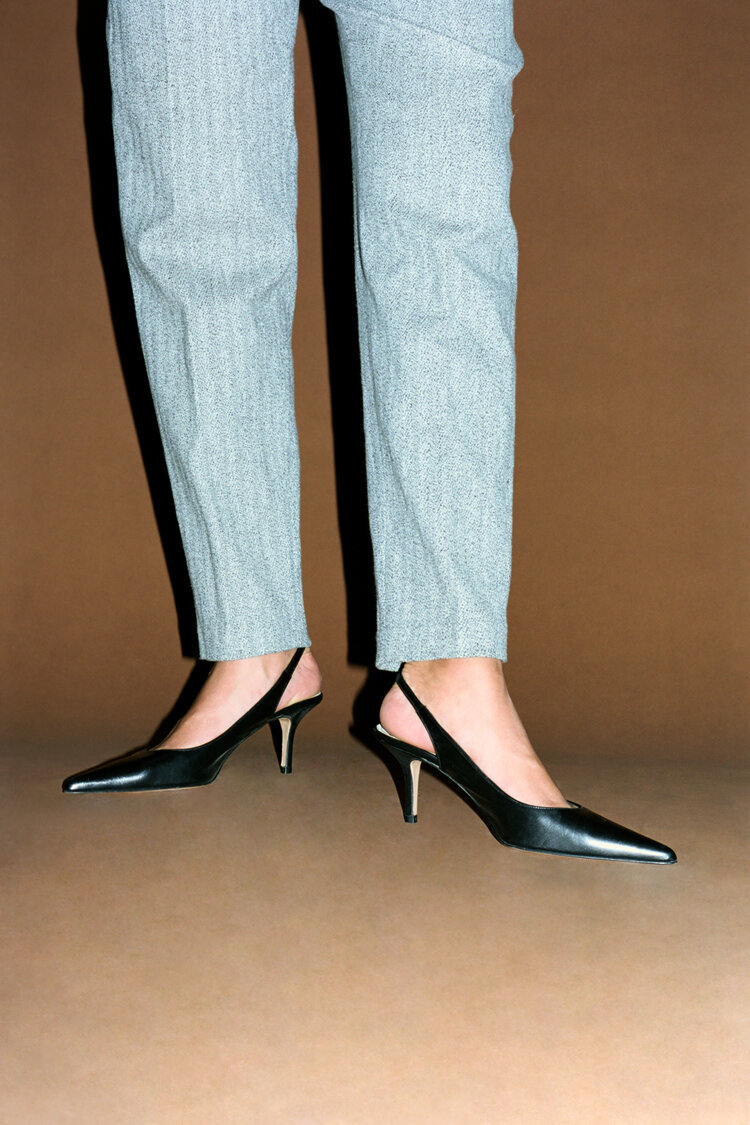 The Break - vintage Coach black leather pumps