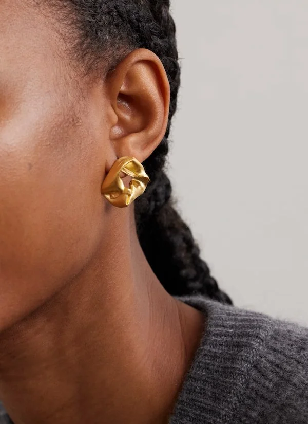 Completed Works statement earrings
