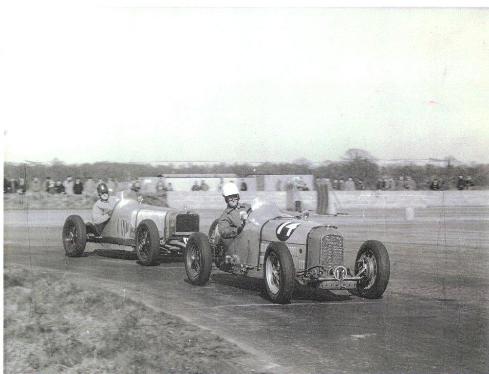 1958 overtaking Delage V12 to win at Silverstone.