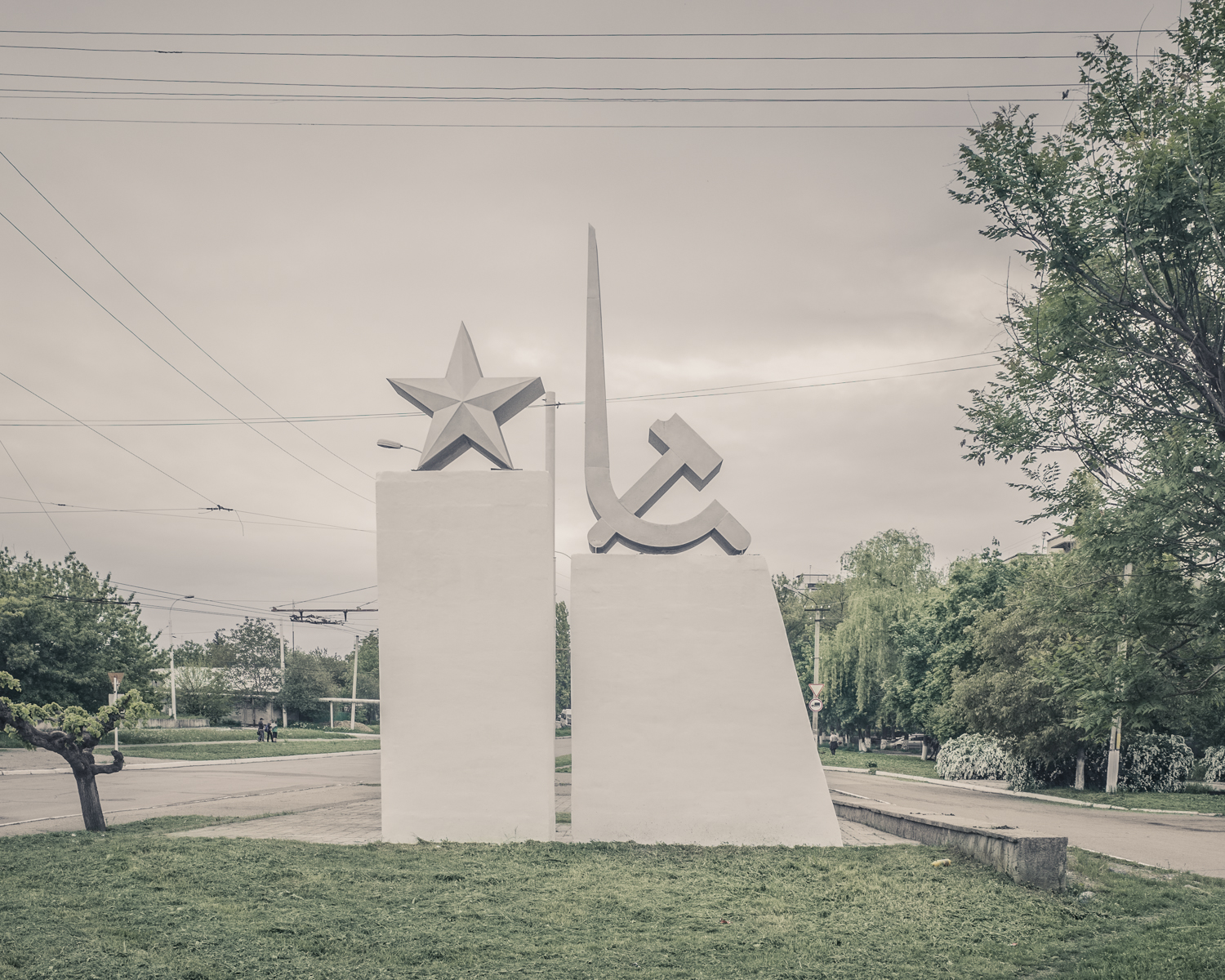   LINKS TO THE MOTHER LAND TRANSNISTRIA | 2015   When communism and Christianity go hand in hand on the roadside.   Transnistria is a narrow strip of land wedged between the Dniester River and the Ukrainian border. Ghost state, Transnistria, 4200 km2