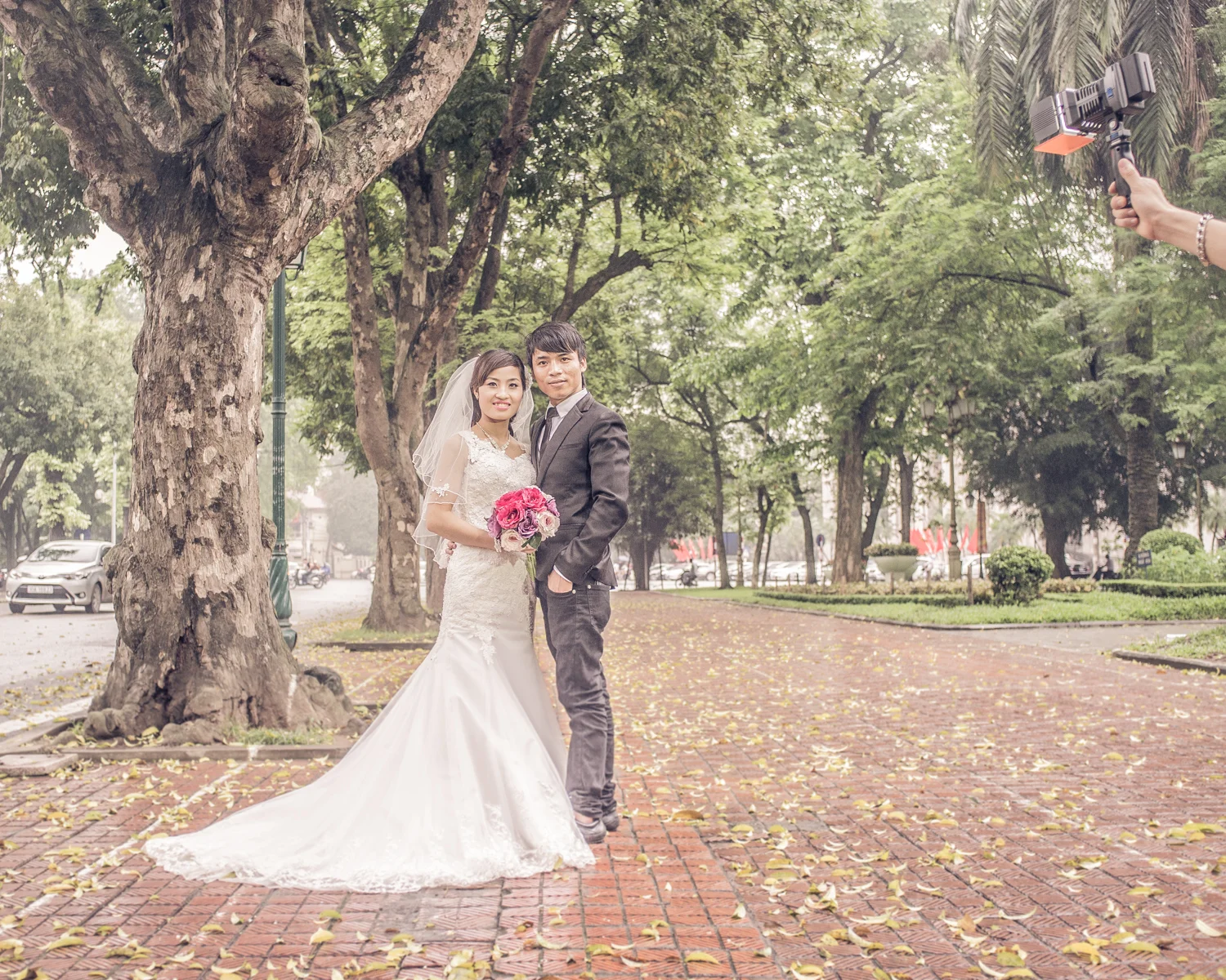 PORCELAIN WEDDING ANNIVERSARY VIETNAM | 2014 Twenty years ago, Vietnam was one of the poorest places in the world. Now it has become a middle-income country and attracts worldwide investors. Vietnam's mix of Marxism and capitalism seems to bring real economic progress to the region. Vietnam converted to a market economy in 1987 but the real turning point was President Bill Clinton’s visit to the country in February 1994, when he officially lifted the U.S. trade embargo against Vietnam, some 19 years after the fall of Saigon to communist forces. For 20 years then this « forced marriage » between Marxism and capitalism seems to have brought real economic progress to the country. Until now, this economic growth has had no real influence on the Vietnamese government, which still systematically suppresses freedom of expression, association, and peaceful assembly, and persecutes those who question government policies, expose official corruption, or call for democratic alternatives to one-party rule. This permanent control of the state on the daily life of the citizens is more and more discreet in the towns, where the middle classes are increasing rapidly in numbers, but still strong and very visible in the countryside where the government deeply fears losing control of the poorest part of the population or of some of the particular ethnic groups in the northern part of the country.