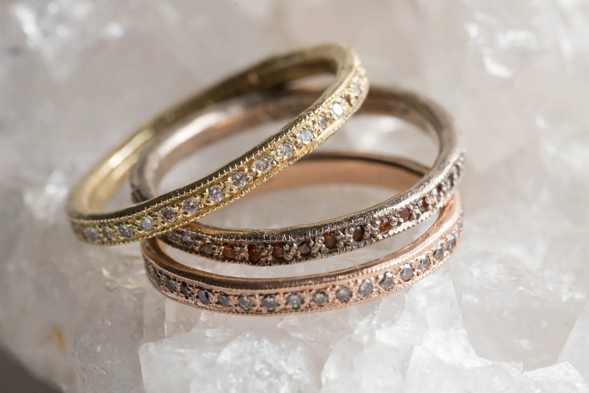 Stack of Gold and Diamond Eternity Rings