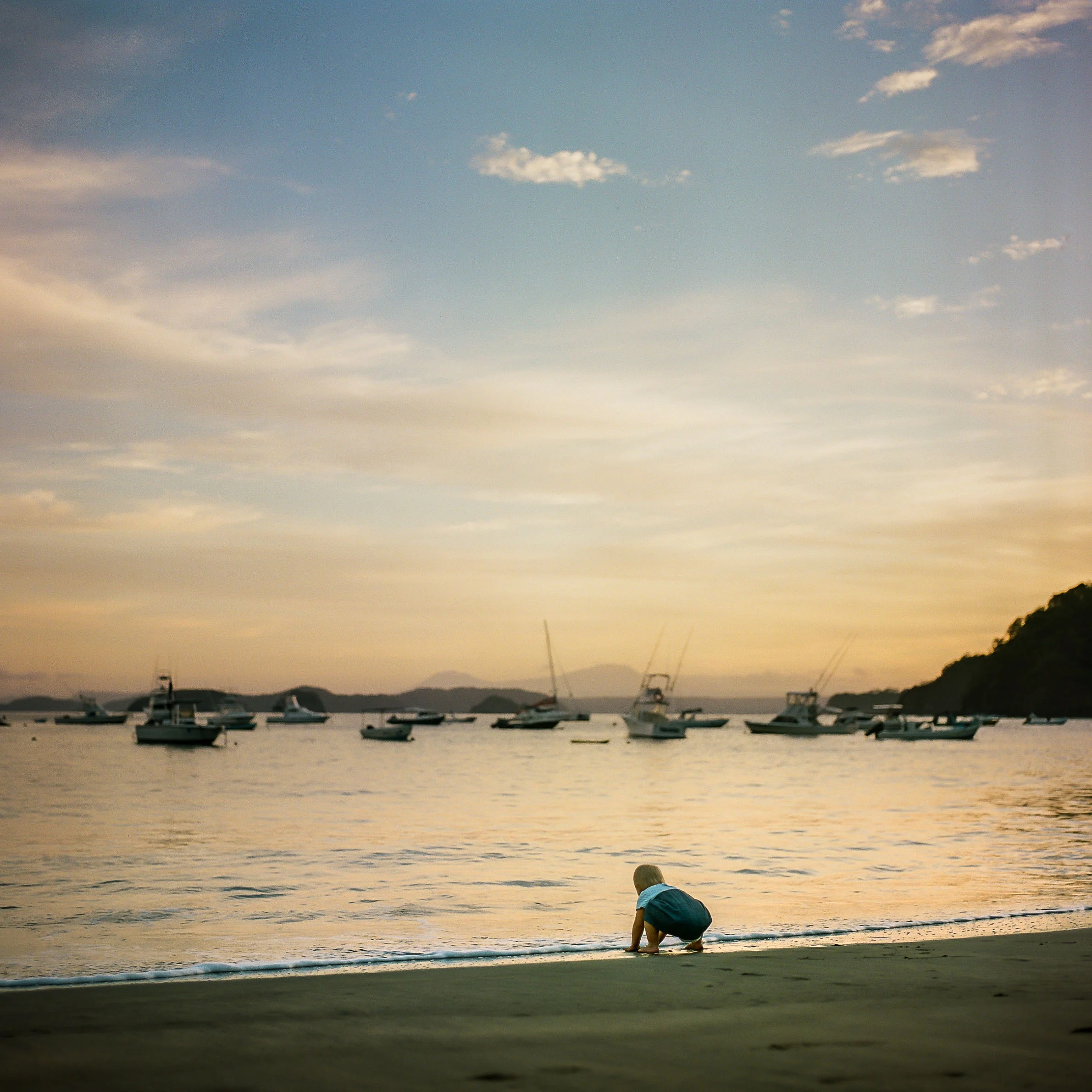 Playing in the waves Playa Ocotal Sunrise on Film