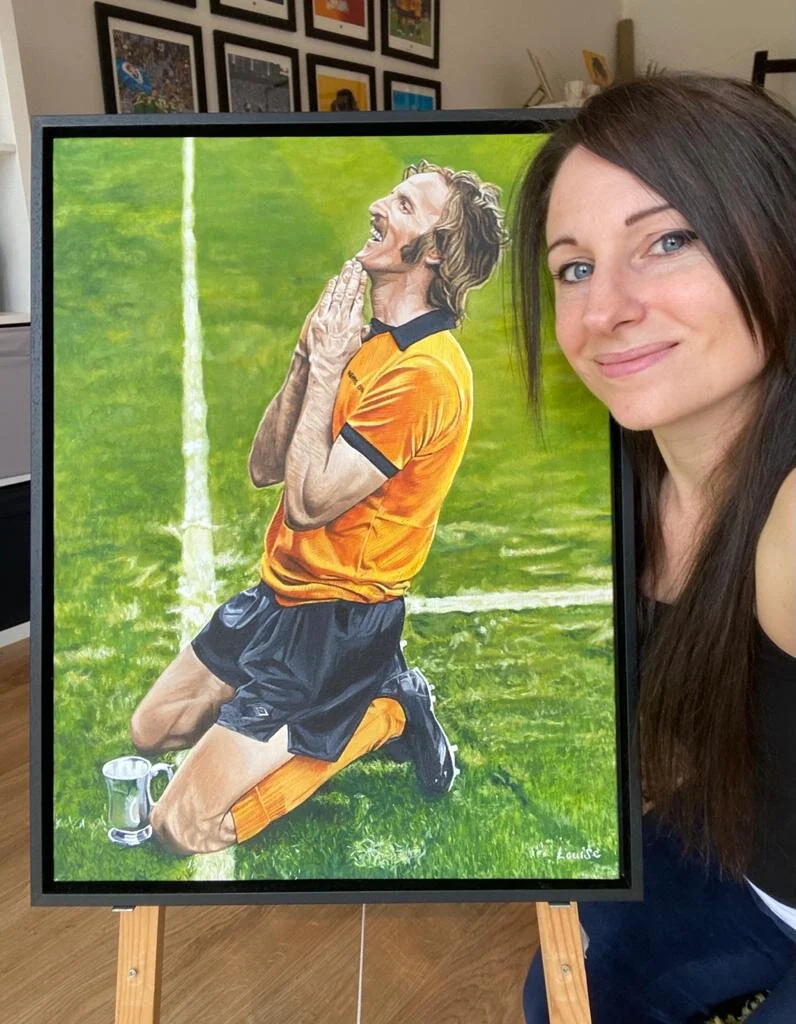 Louise with Derek Dougan painting.JPG